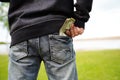 Man with money in pocket of jeans. dollars in pocket of jeans. Royalty Free Stock Photo