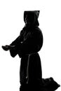 Man monk priest silhouette praying