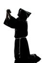 Man monk priest silhouette praying Royalty Free Stock Photo