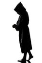 Man monk priest silhouette praying Royalty Free Stock Photo