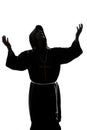 Man monk priest silhouette praying Royalty Free Stock Photo