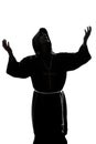 Man monk priest silhouette praying