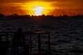 Man fishing at seaside in Izmir during sunset Royalty Free Stock Photo