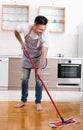Man mopping floor Royalty Free Stock Photo