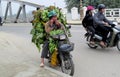 A man on motorbike in Asia with babanas Royalty Free Stock Photo