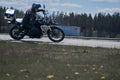 10-05-2020 Ropazi, Latvia man on a motorbike on the road riding. having fun driving the empty road on a motorcycle tour journey