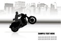 A man on a motorcycle on the background of the city Royalty Free Stock Photo