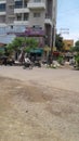 A man with motorcycle driving near saat rasta