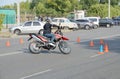 A man motorcycle goes small radius obstacle