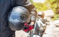 Man in a Motorcycle with helmet and gloves is an important protective clothing for motorcycling throttle control,safety concept