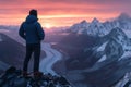 Man on mountain peak sunset view glacier landscape Royalty Free Stock Photo
