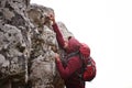 Man, mountain and rock climbing in nature for fitness, wellness and exercise for training and adventure in environment Royalty Free Stock Photo