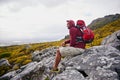 Man, mountains and view with thinking outdoor, travel and hiking for fitness and fresh air with backpacking. Calm, peace Royalty Free Stock Photo