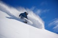 Man in movement carving down a mountain slop on snowboard. Generative AI Royalty Free Stock Photo