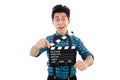 Man with movie clapperboard isolated