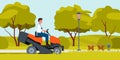 Man mowing grass with lawn mower tractor, worker of landscaping service driving machine Royalty Free Stock Photo