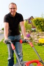 Man mowing lawn Royalty Free Stock Photo