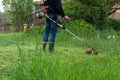 Effortless Lawn Care: Taming the Tall Grass with a Petrol Lawn Trimmer