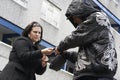 Man Mugging Woman In Street Royalty Free Stock Photo