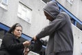 Man Mugging Woman In Street Royalty Free Stock Photo