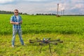 Man with multicopter on ground