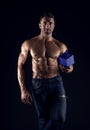 Man with muscular bare torso. best present. Temptation. brutal male hold gift box. muscular and confident macho man Royalty Free Stock Photo