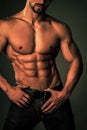 Man with muscular body and torso. Sport and workout. Coach sportsman with bare chest.