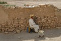 Man musician playing laud at the Kasbah Ait Ben Haddou in Ouarzazate, Morocco October 2019