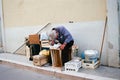 A man naps on wooden fruit boxes. Royalty Free Stock Photo