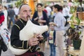 musician in georgian national dress