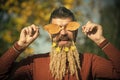 Man with natural spikelet beard sunny fall.