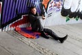 Man near graffiti wall Royalty Free Stock Photo