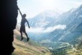 Man Without A Net Hanging Over The Rock Royalty Free Stock Photo