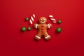 man holiday cookie christmas decoration red background white gingerbread lollipops food sweet. Generative AI. Royalty Free Stock Photo
