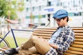 Man with notebook or diary writing on city street Royalty Free Stock Photo