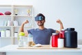 The man with nutrition jars and virtual reality glasses Royalty Free Stock Photo