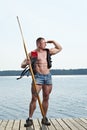 Man with oar Royalty Free Stock Photo