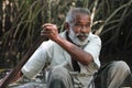 The man with an oar. Portrait. Bentota river, Sri Lanka. Royalty Free Stock Photo