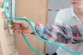 Man in occupational therapy with therapist training his dexterity