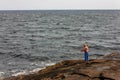 Man Ocean Fishing off the Rocks at Cape Neddick