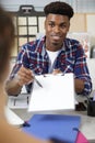 man offering blank white paper in clipboard with pen Royalty Free Stock Photo