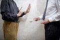 Man Offering a Dollars bribe to a Man Refusing it Royalty Free Stock Photo