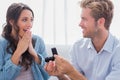 Man offering an engagement ring to his partner Royalty Free Stock Photo