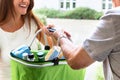 Man Offering Help To His Daughter Carrying Groceries Royalty Free Stock Photo