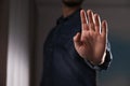 Man offering helping hand on blurred background, closeup Royalty Free Stock Photo