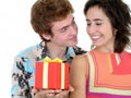 Man Offering Present to Girlfriend Royalty Free Stock Photo