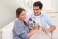 Man offering a rose to his fiance Royalty Free Stock Photo