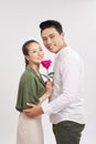 Man offering a rose to his girlfriend over white Royalty Free Stock Photo