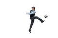 Man in office clothes playing football or soccer with ball on white background. Unusual look for businessman in motion