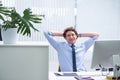 Man, office and relax portrait with computer, happy and confident corporate male person sitting and workspace desk Royalty Free Stock Photo